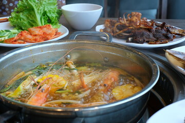 shrimp soup Sour soup with lotus stem and shrimps kaeng som koong with lotus stem, Traditional Thai food