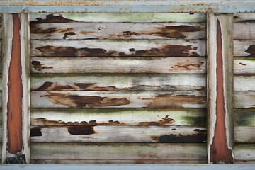 Thin plank pattern, horizontal wood decor. Timestamps. Simple ornament, mosaic. Wooden old boards. Time stamps. Green and brown. Close-up. Save the trees. Ecology. Climate.