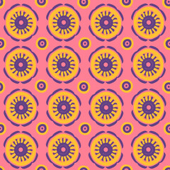 A pattern of yellow and purple flowers with a pink background