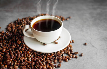 Coffee cup and coffee beans on  gray background, Black coffee cup aromatic