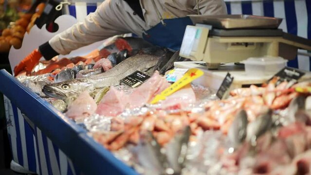 Fresh fish and seafood on farmer market in Paris, France. Typical European fish market.
