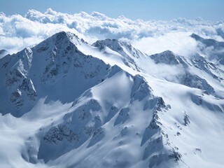 Obraz premium Snow capped peaks of the Greater Caucasus Mountains