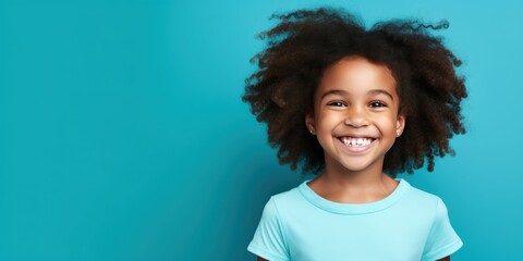 Aqua background Happy black american african child Portrait of young beautiful kid Isolated on Background ethnic diversity equality acceptance concept with copyspace