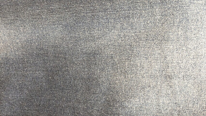 A grey fabric with a shiny texture