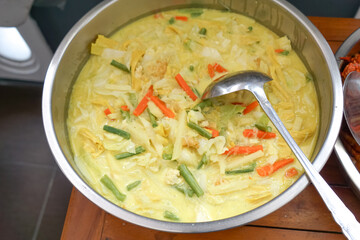 Sayur Lodeh, a flavorful Malay vegetable curry with coconut milk, served in a tray, perfect for sharing and enjoying with rice, ketupat or lontong.