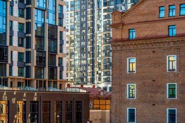 Fototapeta premium New high-rise buildings in the city center. Urban architecture.