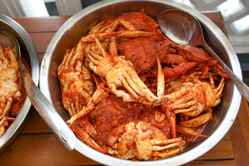 Close up a tray of chilli crabs