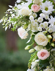 Close up wedding flowers arch in a garden, holiday event decoration