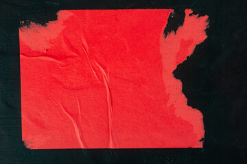 Red paper with folds as background.