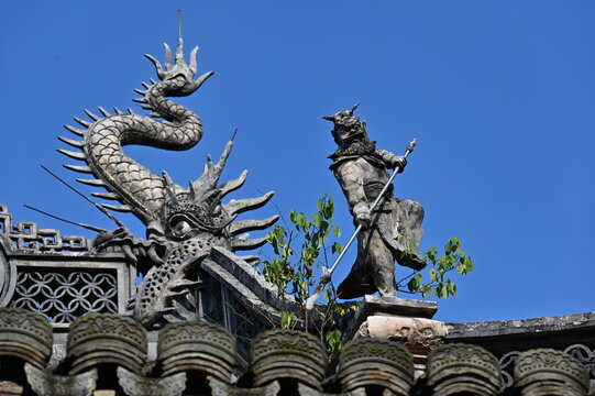 closeup of ancient Chinese temple roof, the statue of monkey king 