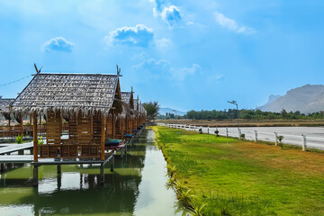 Traditional bamboo hut with thatched roof for relaxing with landscape view. Asian traditional hut...