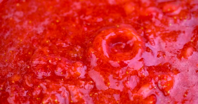 strawberry puree of fresh red strawberries, homemade organic strawberries while cooking berry puree and jam