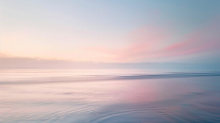 A beautiful ocean scene with a pink and purple sky