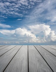 Grey Wooden Table for Product Display with Blue Cloudy Sky