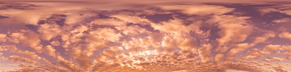 Sunset sky with bright glowing pink Cumulus clouds. Seamless spherical HDR 360 panorama. Full zenith or sky dome in 3D, sky replacement for aerial drone panoramas. Climate and weather change.