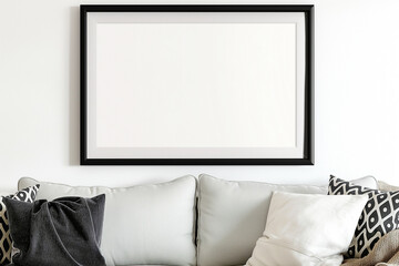 A white frame with a blank canvas against a light wall and on a wooden tabletop with vase. Layout concept for photography, poster or painting. Copy space.