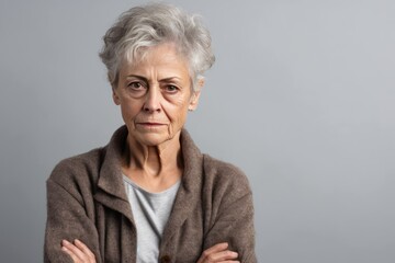 Silver background sad european white Woman realistic person portrait of young beautiful bad mood expression Woman Isolated on Background depression