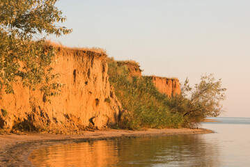 30-meter clay cliffs on the banks of the Dnieper-Bug freshwater estuary as a result of current...