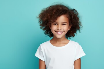 Turquoise background Happy european white child realistic person portrait of young beautiful Smiling child Isolated on Background Banner with copyspace blank empty 