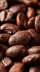 Close-up of roasted coffee beans showing rich texture and color, perfect for food and drink themes. Ideal stock photo for coffee enthusiasts and businesses.