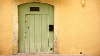 traditional access door to the building on the facade