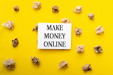 The sign is surrounded by crumpled paper, giving the impression of a cluttered