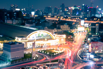 Blurred abstract background lights, beautiful cityscape view of Bangkok city skyline at night in Thailand.