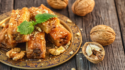 Traditional arabic dessert Baklava with honey and walnuts.