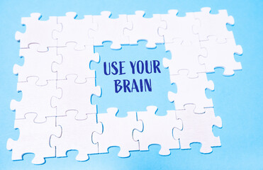 A puzzle with the words use your brain written in the middle