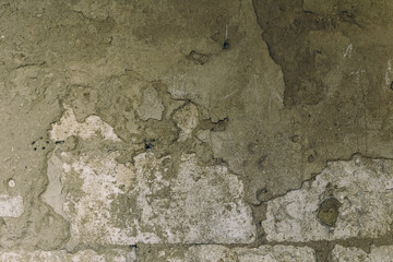 A wall with a rough, textured surface
