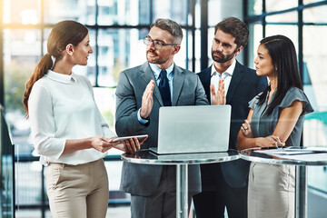 Business man, laptop and meeting with group for presentation of ideas, proposal and questions at job. People, team and leader in discussion, brainstorming or listen with computer at insurance agency