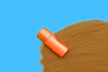 Orange container on the sand. Natural cosmetics in summer. On a blue background.