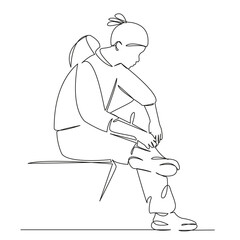 girl tying a shoelace