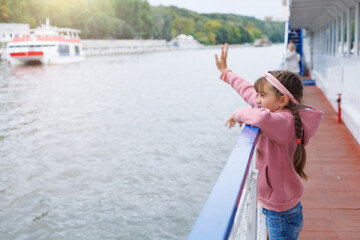 Girl greeting, say goodbye for ship cruise, international transport or travel. Side view girl in...