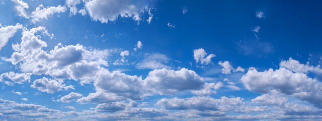 White cumulus clouds in blue sky beautiful cloud background.