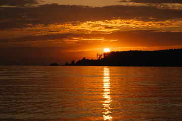 Fototapeta premium Sea and coast view in the evening at sunset. Beautiful view