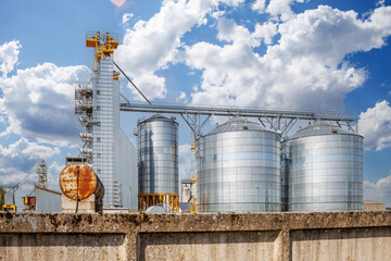 silos granary elevator on agro-industrial complex with seed cleaning and drying line for grain...