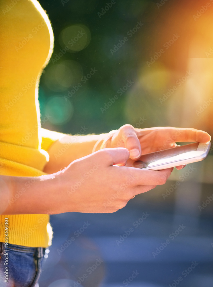Poster outdoor, hands or person with mobile for typing, chat and browsing online on social media. bokeh, sm