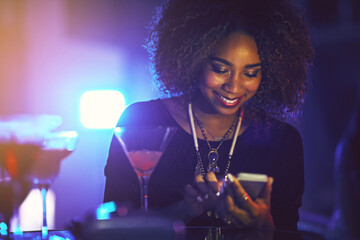 Phone, smile and black woman at nightclub, party or celebration event on social media. Smartphone,...
