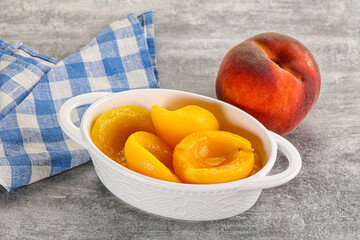 Ripe sweet and juicy canned peach