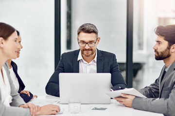 Laptop, discussion and business people in office for teamwork on financial budget planning for company. Meeting, collaboration and group of finance advisors with computer for investment research.