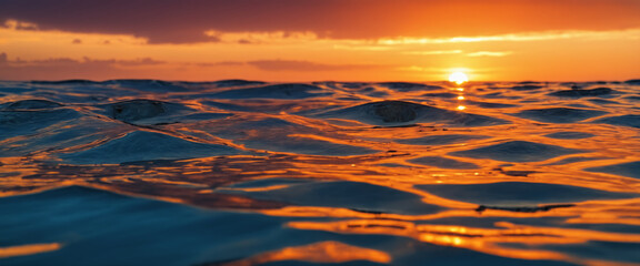Fototapeta premium Colorful sunset with ocean waves and clouds