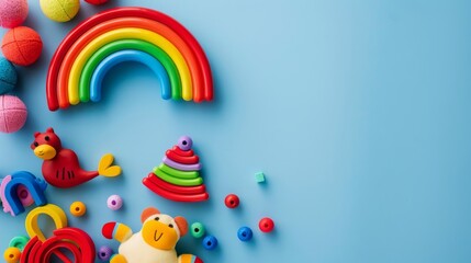 Colorful rainbow kids toys arranged on a bright blue background for playful and cheerful child's room decor