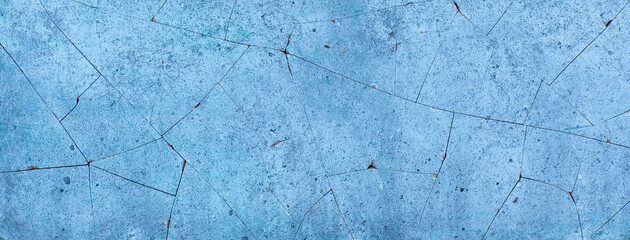 background and texture of blue cracked and broken concrete