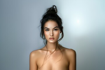 Obraz premium Attractive face of a young beautiful smiling woman. Feminine beauty.