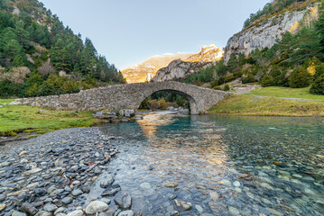 The Bujaruelo Bridge is a 13th century Romanesque bridge over the Ara River, in the province of Huesca, in the Aragonese Pyrenees.
