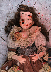 bloody vintage scary broken doll