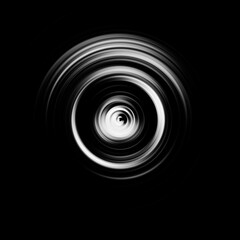 Black and white radial motion effect. Abstract rounded background. Grayscale curves and sphere.