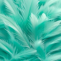 close up view of soft delicate overlapping feathers in light green color. concepts: elegance, softness, luxury, art and craft stores for promoting products related to feathers or similar textures
