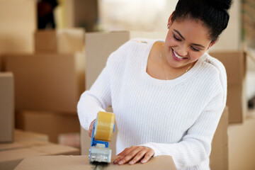 Tape box, woman and smile in house for move, packing and packaging for donation or charity. Female...
